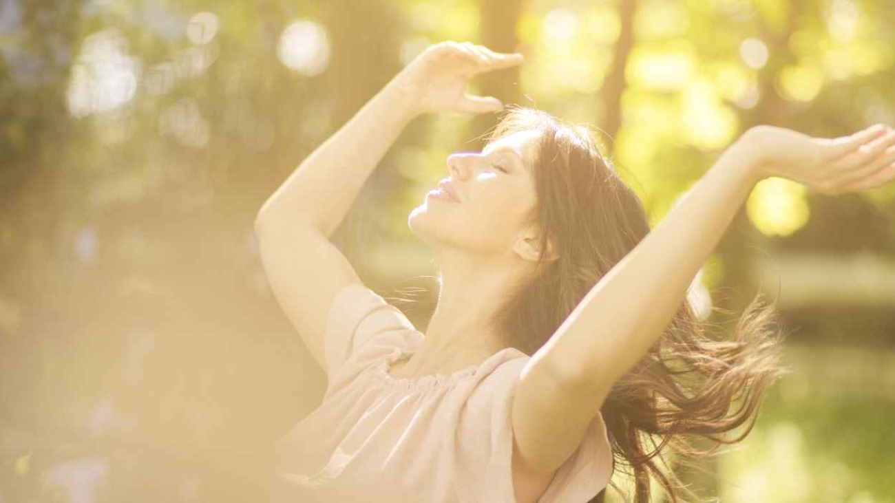 a-lady-enjoying-morning-10am-sunlight