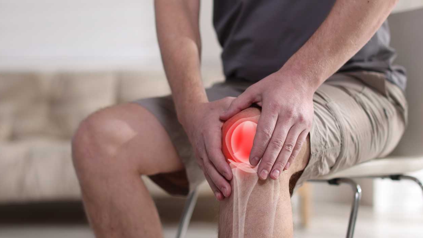 man-suffering-from-knee-joint-pain-and-it-is-a-closeup-illustration-of-joint-inflammation-on-his-leg